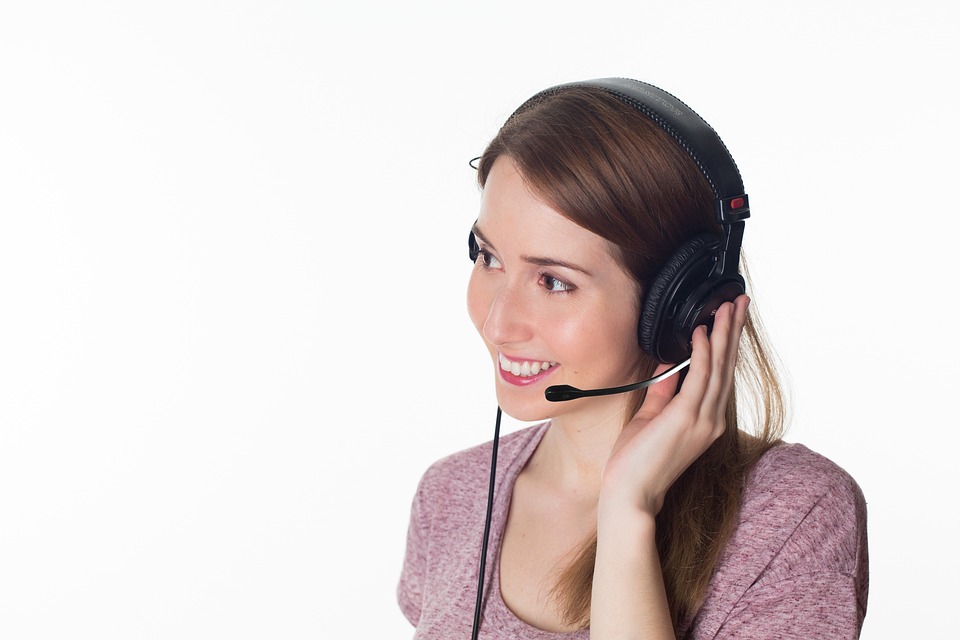 A woman on a phone headset